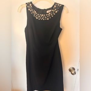Calvin Klein black dress size 6 fits a size 4 runs small